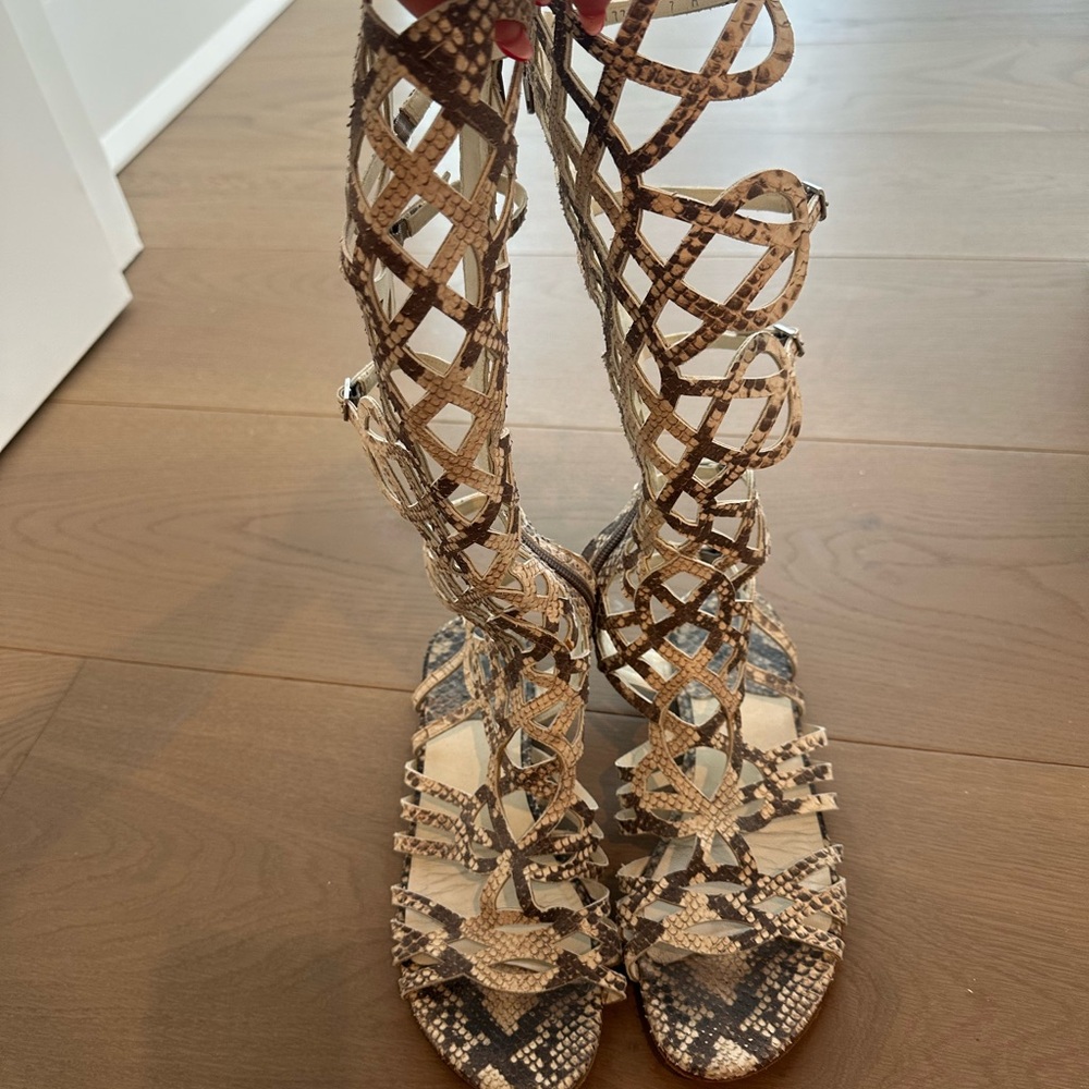 Stuart Weitzman Snake-Print Gladiator Sandals in Brown and Tan